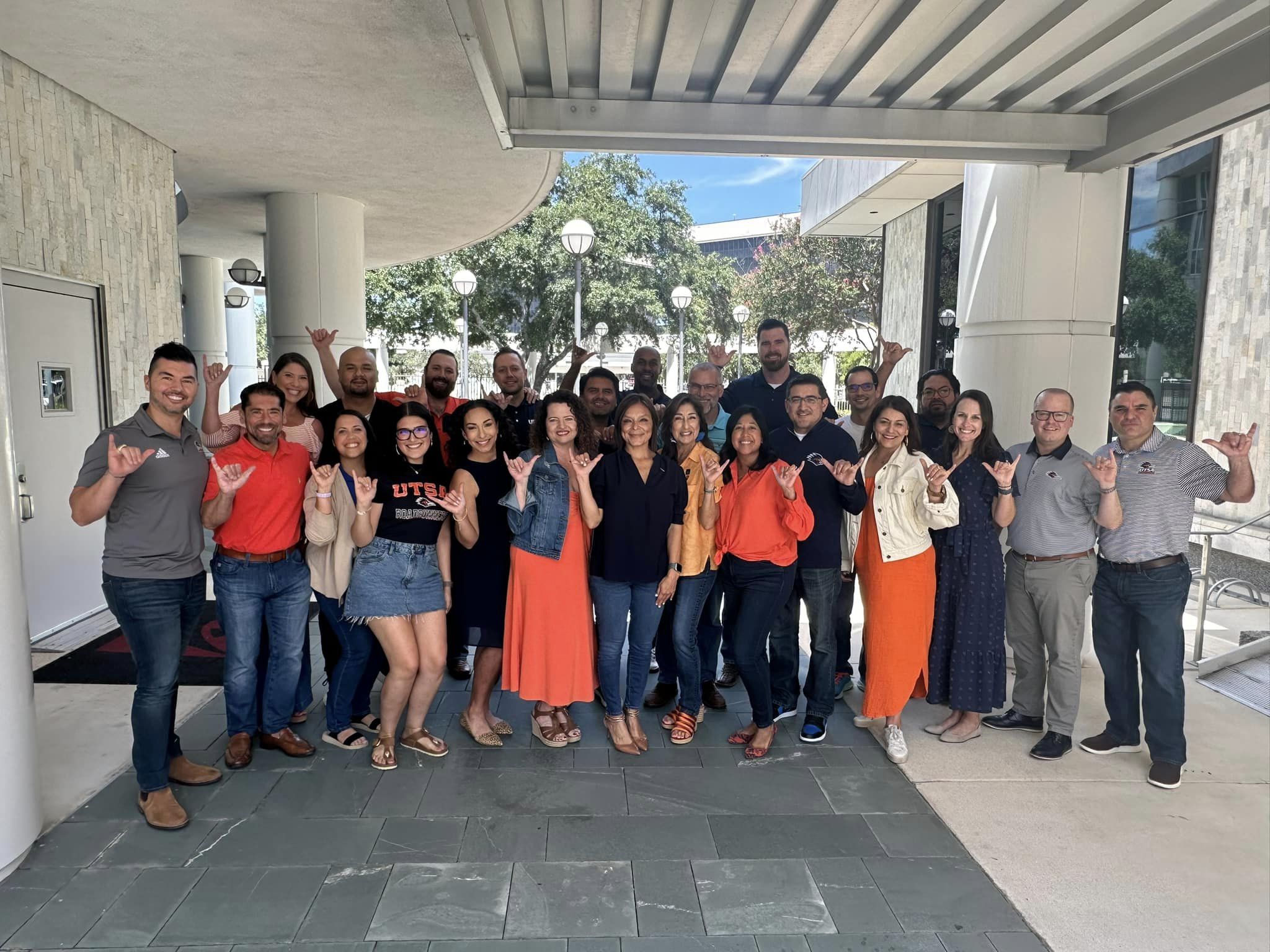 Board of Directors giving birds up on UTSA campus
