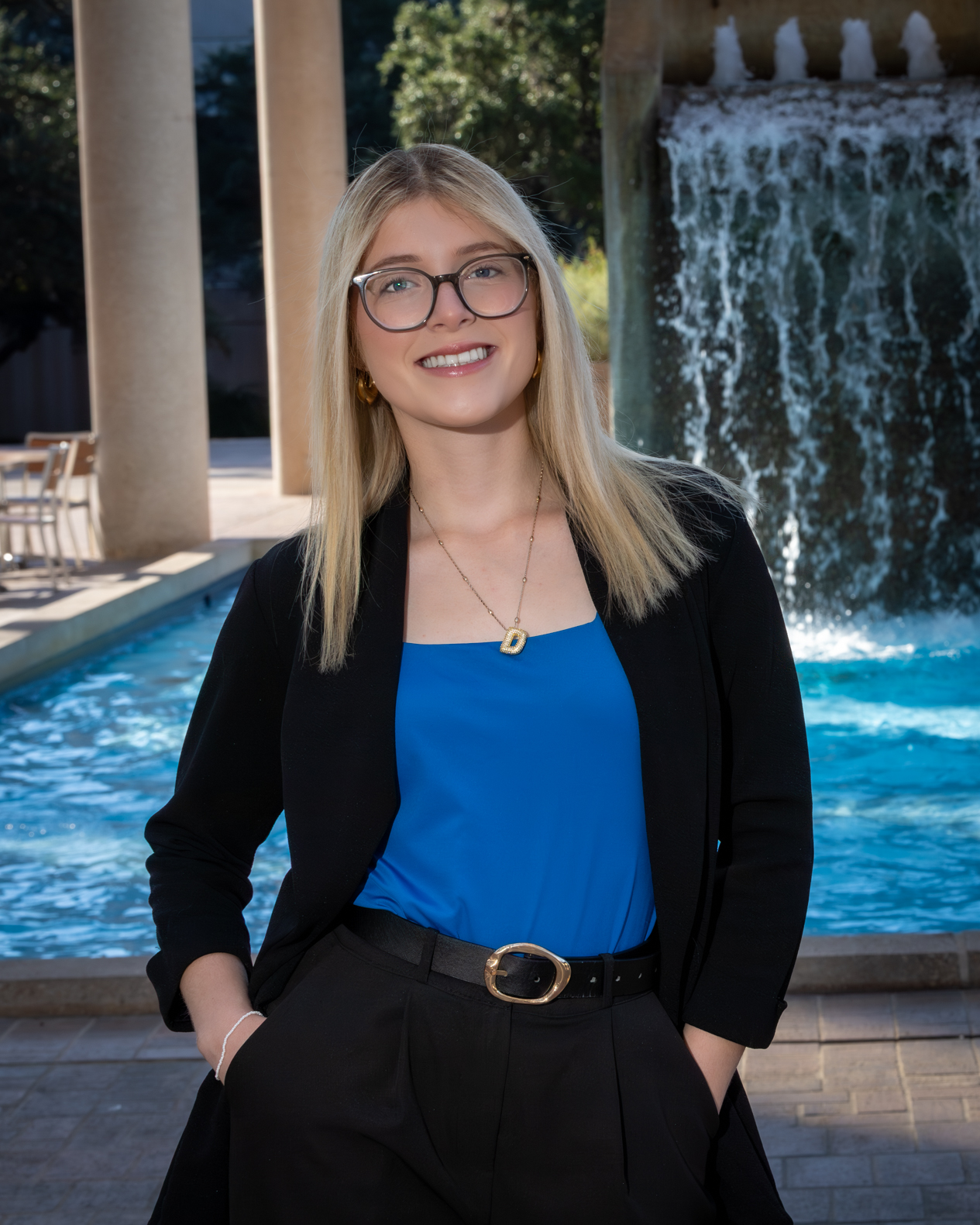 Diamond Gomez in front of the Sombrilla fountain
