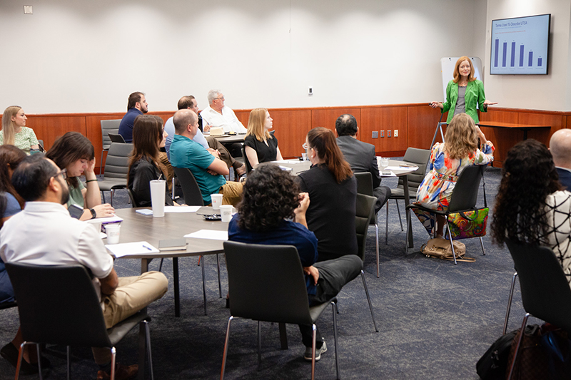 Advancement Academy members listening to guest speaker