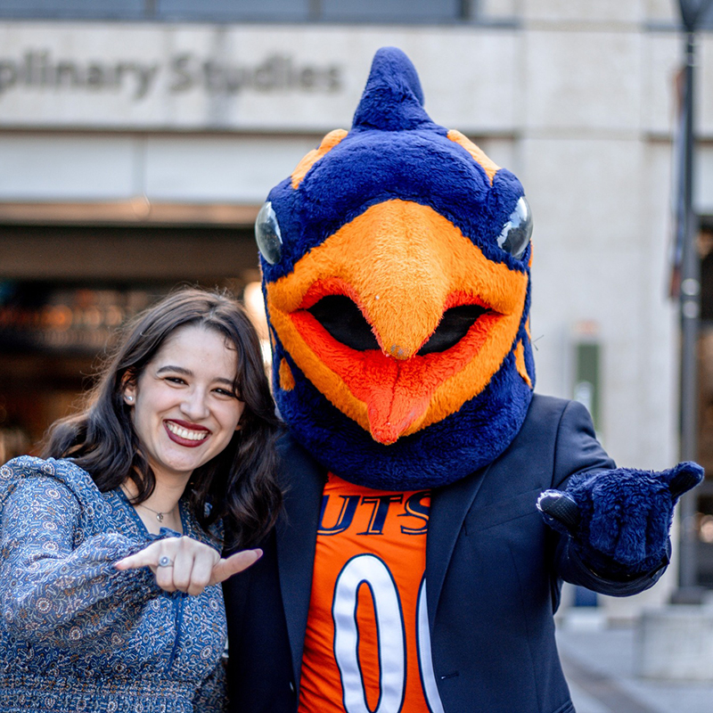 Student showing class ring with Rowdy