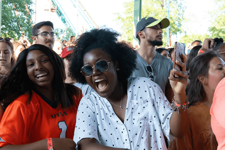 Group of students cheering for their team
