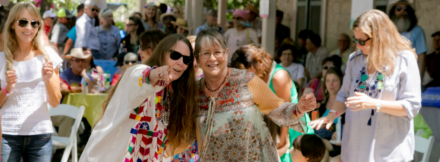 Group of people enjoying fiesta arts fair