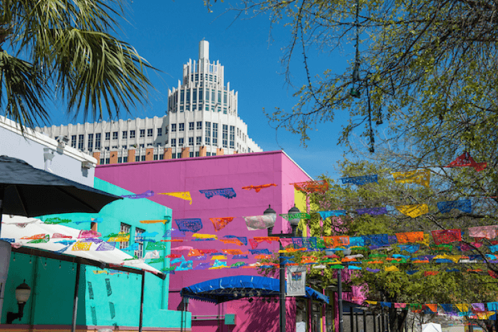 Student climbing a rock wall