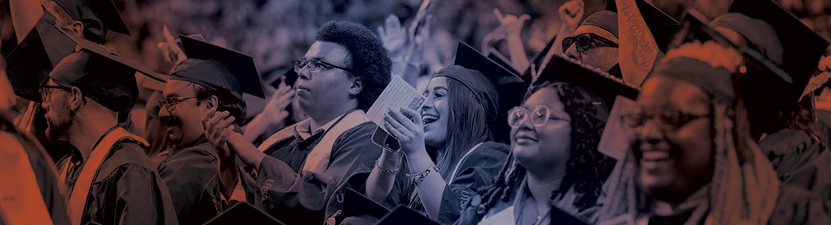 Students smiling at commencement