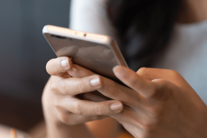 A person using a mobile phone