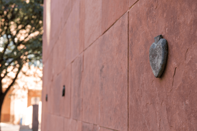 Milagros on the walls of the university